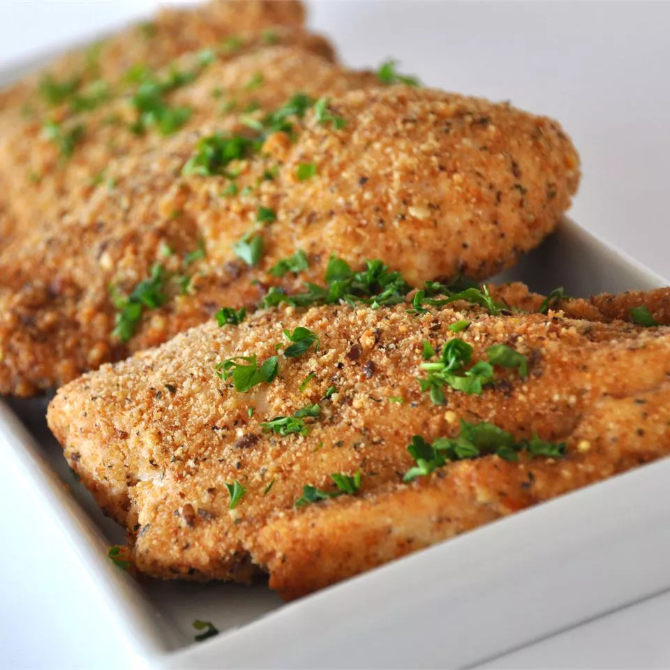 Baked Garlic Parmesan Chicken on a white background